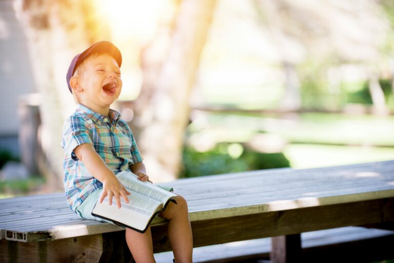 Happy healthy baby laughing